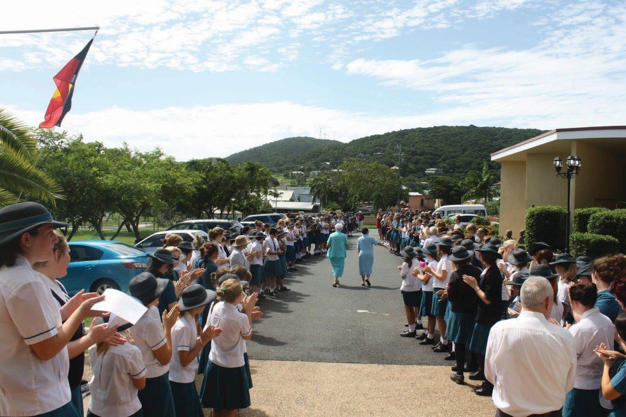 A photo of the students from St Ursula's College forming a guard of honour for a departing teacher - Sister Andrea McGrath.