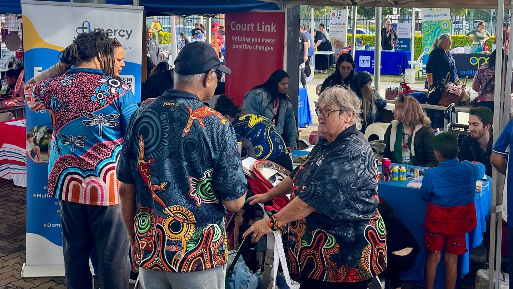 Mercy Community staff supporting NAIDOC Week at a community event.